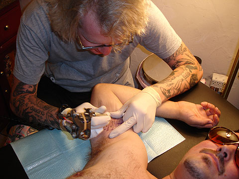 Sam Flores got his first tattoo. sam_tat.jpg