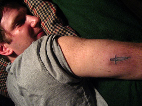 initial tattoos on back of arm. After a long while of poking your friend in the arm, the dots finally start 